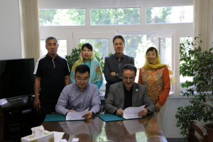 A Delegation from Research Center for Hybrid Wheat of China Visited UTCAN